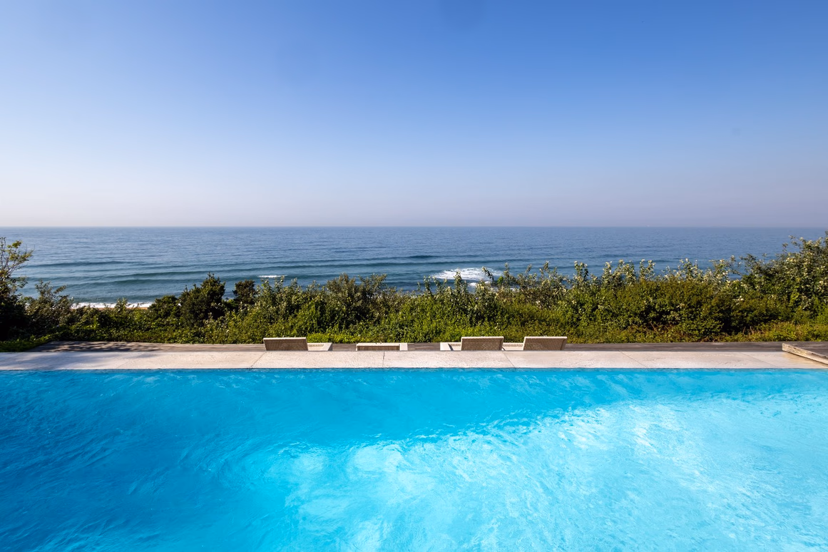 Uninterrupted Indian Ocean view beyond the swimming pool at 12 Milkwood Street